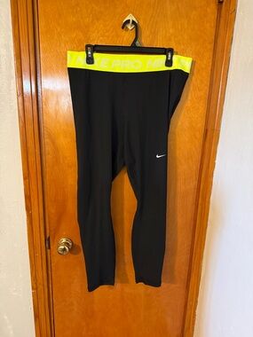 Nike Women’s Black Leggings with Neon Yellow Waistband